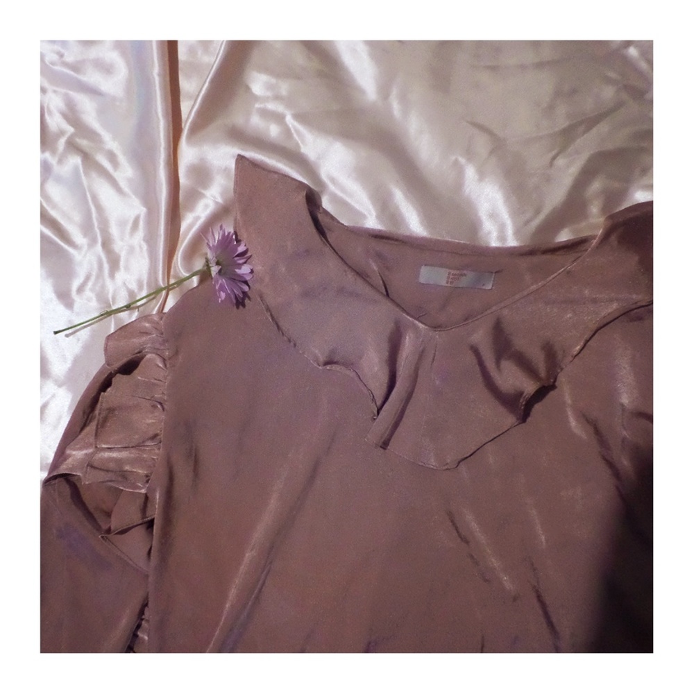 purple frilly long sleeve top